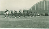 Scottish Highlanders in formation on west side of Armory, The University of Iowa, 1930s