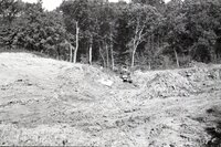1970s Earthmoving machinery in field