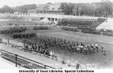 Governor N.E. Kendall reviewing military band on Iowa Field, The University of Iowa, May 13, 1922