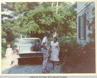 John, Jr., Bill and unknown woman by truck