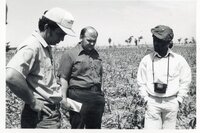 William Baugh talks with others on agricultural tour