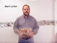 Staff holding doughnuts
