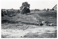 1970s Earthmoving machinery in field