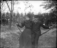 UP512 E.W. Hanson and woman on vine