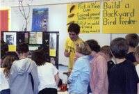 Students make pine cone bird feeders