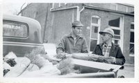 Three Men Loading a Truck