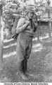 Boy scout with back pack, The University of Iowa, 1914