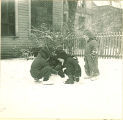 Small children  playing in the snow, The University of Iowa, January 1938