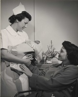 Nurse, baby and mother.