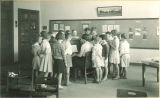 Students singing, The University of Iowa, May 19, 1932
