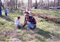 2002  Soil Conservationist Troy Deutmeyer helps girl scouts plant trees