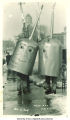 Oil can costumes in Mecca Day parade, The University of Iowa, 1923