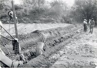 1970s Earthmoving machinery in field