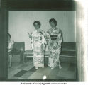 Foreign students wearing kimonos at a multi-cultural party, 1960s