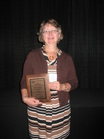 2012 Iowa Soil Conservation State Teacher Award Winner Nancy Carter and Des Momes, County SWCD Chairperson Maureen Hutchcroft 
