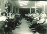 Patients in dental clinic in Old Dental Building, The University of Iowa, 1900s