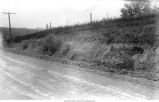 Kansan gumbotil with Iowan till above, gumbotil line marked by cleared area and field bag, Wayne Township, Iowa, July 08, 1924