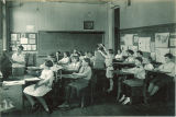 Students giving slide presentation, The University of Iowa, 1925