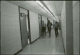 Three professors in hallway, 1973