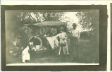 Elfie and Sam Minard arriving home from a road trip, Conrad, Iowa, 1910s
