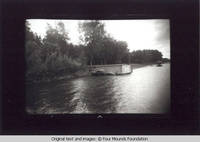 Boat house on river