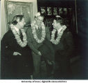 Men wearing leis at formal dance, The University of Iowa, 1940s