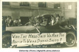 Engineers in tuxedos and top hats in Mecca Day parade, The University of Iowa, 1919