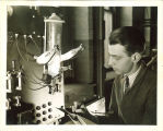 Engineering student experimenting with electricity in engineering laboratory, The University of Iowa, 1939