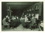 Students playing cards on sunporch in Iowa Memorial Union, the University of Iowa, 1927