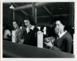 Three cadets are practicing drilling a piece of metal, 1943