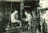Student and instructor in Physics laboratory, The University of Iowa, 1930s