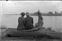 LR 302 Couple on log