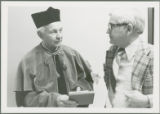Benela Heady in his honorary Polish academic robes talking with his department chair, Raymond Beneke, 1979