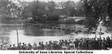 Cadets building bridge over Iowa River, The University of Iowa, 1924