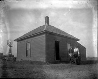 AG 216  Humble farmhouse with family