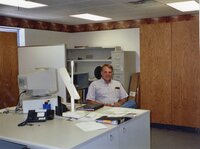 2003   District Employee Dale Schmeiser sits in his office at the Des Moines County Soil and Water Conservation District office
