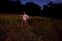 Eric Hoien Poses in Native CRP Field.