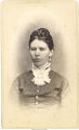Woman with ruffled collar and earrings, Postville, Iowa, 1900s