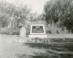 Alumni Hall Homecoming lawn display, ""Let's bury the Buffs,"" 1954