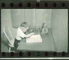 Boy playing with toys, The University of Iowa, 1938