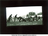 Duke Slater blocking Notre Dame line, The University of Iowa, 1921