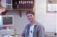 2000  Coop employee Chris Hogge works in the office