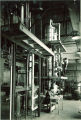 Scientists working in Chemistry department  machine shop, The University of Iowa, 1930s