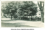 Crowd lined up to enter Old Capitol, The University of Iowa, 1910s
