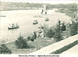People watching students canoeing the Iowa River on Mother's Day, The University of Iowa, April 30, 1938