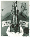 Physics student operating scientific equipment, The University of Iowa, 1960s