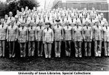 Navy battalion posing next to Armory, The University of Iowa, October 4, 1944