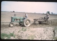Tractor Pulling Farm Plow