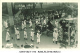 Maypole participants in  parade, The University of Iowa, 1910s