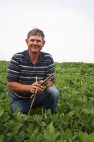 Unidentified person in bean field 